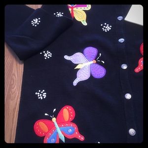 New, black butterfly sweater-tags attached.